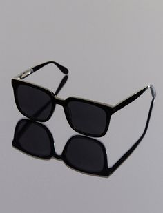 A polished pair that flatters every look. Made from black acetate, these shades feature a classic square design with a smoke solid lens.*This item is not eligible for Express or Premium shipping Classic Rectangular Acetate Sunglasses, Trendy Square Sunglasses For Formal Occasions, Black Square Sunglasses With Polarized Lenses, Chic Matte Black Square Frame Sunglasses, Black Square Sunglasses With Gradient Lenses, Classic Black Sunglasses For Everyday, Classic Black Everyday Sunglasses, Chic Matte Black Rectangular Sunglasses, Square Acetate Sunglasses With Tinted Lenses