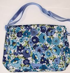 Vera Bradley Messenger Bag - New with Tags Lighten Up Nylon Material in Blueberry Blooms PATTERN 14"W x 12"H x 4" D with 56" adjustable shoulder strap. The exterior features one large back zip pocket and a front slip pocket under the flap with room for pen etc.  The interior has two more slip pockets and is lined in VB signature light blue nylon.    This bag is the lighten up nylon material not the quilted material From smoke-free environment Authentic Vera Bradley: Purchased by ME from Vera Bradley and a gift receipt from MY purchase is included Blue Nylon Shoulder Bag With Detachable Strap, Blue Shoulder Bag For School In Spring, Blue Nylon Shoulder Bag With Adjustable Strap, Blue Rectangular Nylon Shoulder Bag, Blue Nylon Rectangular Shoulder Bag, Blue Nylon Crossbody Shoulder Bag, Blue Nylon Shoulder Bag, Blue Nylon Bags For Spring, Blue School Shoulder Bag With Adjustable Strap