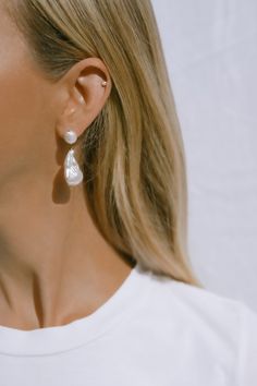 Our Coco earrings are eternal classics. Pair these & a red lip with jeans for Parisienne chic or walk down the aisle in these beauties.  - Baroque pearl studs on 18k Gold Filled backs - Large hand selected luminous freshwater baroque pearls (1 inch) - Gold filled wire - Approx 1.5 inch drop Please keep in mind that Baroque Pearl Bridal Earrings For Formal Occasions, Formal Bridal Earrings With Baroque Pearl, Formal Bridal Baroque Pearl Earrings, Elegant Bridal Earrings With Baroque Pearls, Islamorada Wedding, White Silk Dress, Pearl Veil, Parisienne Chic, Pearl Earrings Wedding