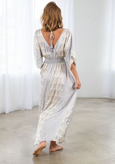 A must-have ethereal maxi dress in a bohemian mixed floral print. Featuring a flattering deep v-neckline, a smocked elastic waist for definition, and breezy open tassel tie-back detail. The soft and silky hand feel elevates this essential warm-weather style. Mixed floral print Relaxed fit Split kimono sleeve Maxi length Open back with tassel tie closure Smocked elastic empire waist Silky hand feel Model is 5'9, wearing a size S.Style: I-72352W-RKM-BS Silky Maxi Dress, Short Kimono, Floral Kimono, Sleeve Maxi Dress, Kimono Sleeve, Maxi Dress With Sleeves, Favorite Dress, Empire Waist, Perfect Dress