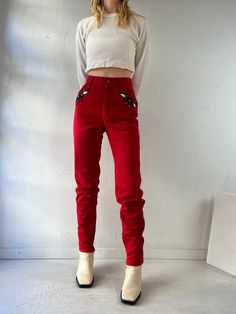 "- Vintage Escada red jeans - Beading details below the pockets - Hidden zippers at the ankles - Some very minor fading on one thigh - 100% cotton - Made in Italy - Tagged 36 Waist: 25\" Rise: 11\" Inseam: 31\" Hip: 17\"" Red Mid-rise Cotton Jeans, Fitted Red Cotton Jeans, Red Fitted Vintage Jeans, Fitted Vintage Red Jeans, Beaded Jeans, Burgundy Leather Jacket, Red Jeans, Union Made, Knitted Pullover Sweaters