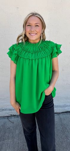 The Entro Need You Tonight Blouse is your go-to top for any occasion. This solid chiffon blouse features a mock-neck and pleat detail, adding a touch of elegance to any outfit. With a button closure at the back and a lightweight, non-sheer fabric, it's both stylish and practical. (You'll look amazing, trust us!) 100% Polyester Sleeveless Solid Color Blouse For Work, Chic Non-stretch Chiffon Blouse, Spring Sleeveless Blouse In Solid Color, Flowy Solid Color Tops, Spring Chiffon Blouse With Stretch, Trendy Chiffon Tops For Work, Sleeveless Pleated Tops For Spring, Summer Stretch Pleated Top, Pleated Stretch Top For Summer