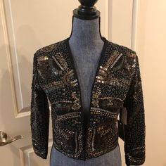 Trouve' Multi Colored Black Beaded Evening Bolero - Size Xs- 100% Cotton Shell With Heavy Beading In Gold, Silver, Black And Gunmetal -Three Quarter Length Sleeves, Open Style, Bolero Styling Sleeves 18", Bust 32", Shoulders 16", Length 18" Tags On - Pristine Chic Embellished Outerwear For Party Season, Embellished Outerwear For Party Season And Night Out, Fitted Embellished Outerwear For Party, Embellished Fitted Party Outerwear, Fitted Embellished Party Outerwear, Embellished Black Outerwear For Party Season, Black Embellished Outerwear For Party Season, Black Embellished Evening Outerwear, Black Sequined Outerwear For Party Season