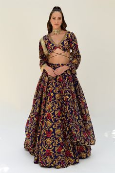 Blue pure silk lehenga with floral pattern. Comes with a blouse and a dupatta.
Components: 3
Type Of Work: Floral
Neckline: V Neck
Sleeve Type: Half
Fabric: Pure silk
Color: Blue
Other Details: 
Criss cross tie-up on blouse
Occasion: Cocktail, Destination Wedding - Aza Fashions Elegant Floral Print Choli For Diwali, Silk Sets With Floral Print For Reception, Silk Floral Print Sets For Reception, Chanderi Floral Print Party Sets, Chanderi Sets With Floral Print For Party, Chanderi Party Set With Floral Print, Floral Print Choli For Eid Party, Party Floral Print Chanderi Set, Eid Party Lehenga With Floral Print