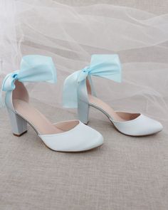 Satin block heel with satin ribbon ankle tie. Beautiful and yet looks fun and dramatic.DETAILS:HEEL HEIGHT: 3 inchesCOLORS AVAILABLE: Champagne, White, Ivory, Navy, Burgundy, and Light BlueUPPER: Synthetic upper and liningMATERIALS: Mandmade outsoleSTYLE NAME: SARAH