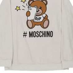 Description:Vintage 14 Years white Moschino sweatshirt, fits medium.GENDER: girls CONDITION: very good.STYLE: sweatshirtERA: 1990sCOLOUR: whiteFABRIC: cottonNotes: Teen. Pit to Pit: 19" Retro White Sweater With Letter Print, White Retro Sweater With Letter Print, Cute White Sweatshirt For Streetwear, White Retro Cotton Sweater, Retro White Hoodie With Graphic Print, White Cartoon Print Sweatshirt For Streetwear, Cute White Sweatshirt With Graphic Print, White Cotton Sweater With Graphic Print, Cute White Sweatshirt With Cartoon Print