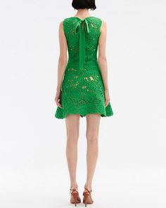 Oscar de la Renta Cactus Jewel Neck Crochet Poppy Dress Round neck Sleeveless Self-tie back; keyhole detail Fit and flare Mini length Crochet fabrication 100% cotton Made in Italy Sleeveless Crochet Dress For Garden Party, Chic Sleeveless Cotton Crochet Dress, Green Sleeveless Crochet Dress For Spring, Nude Slip Dress, Crochet Poppy, Sleeveless Cotton Dress, Poppy Dress, Evening Jumpsuit, Crochet Fashion Patterns