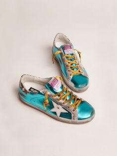 Super-Star is the classic that we love updating from season to season. This model elevates its design thanks to the laminated leather upper combined with a snake-print heel tab and logoed laces. Sneakers With Stars, Shoes Golden Goose, Dirty Shoes, Snake Heels, Exclusive Sneakers, Golden Goose Sneakers, Shoe Inspiration, Shoe Inspo, Luxury Sneakers