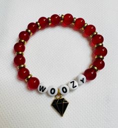 Woozy's Red Ruby themed bracelet Trendy Red Round Jewelry, Trendy Red Bangle Jewelry, Customized Red Casual Jewelry, Customized Casual Red Jewelry, Casual Customized Red Jewelry, Casual Red Customized Jewelry, Adjustable Red Round Charm Bracelet, Adjustable Red Charm Bracelet, Adjustable Round Red Charm Bracelet