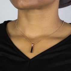 This pencil-shaped Black Tourmaline crystal necklace is set in 14k rose gold vermeil pendant is a beautiful statement piece. Wear this gemstone every day with anything and everything. Keep this stone with you to help you stay grounded and secure. Beauty not only repels and protects against negativity, but it also protects against being victimized by the negative energy of others, while also increasing physical vitality, emotional stability, and intellectual brilliance. Stone Origin: Brazil Measu Black Wear, Black Tourmaline Necklace, Garnet Birthstone, Emotional Stability, Black Tourmaline Crystal, Stay Grounded, Tourmaline Pendant, Rose Quartz Necklace, Garnet Necklace