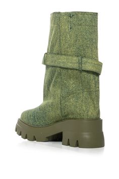 Put your trendiest foot forward in The AZALEA WANG Marceline Bucket Green Denim Bootie! This streetwear-inspired shoe is made with a colored denim upper and features a mid-calf shaft height, an almond toe silhouette, a ridged flatform sole, tonal stitching, and an elasticated side slit panel for ideal stretch. Complete with a strappy belted accent, a faux silver metal buckle, and an easy pull-on fit. (all measurements are approximate from size 8) - Denim Upper - Almond Toe - Mid-Calf Shaft Height - Ridged Flatform Sole - 2.5” Heel Height - 1.5” Sole Height - 9.25” Shaft Height - 14.25” Circumference - Imported Product ID: 380054 Azalea Wang, Colored Denim, Metal Buckles, Mid Calf, Metallic Silver, Heel Height, Street Wear, Boots, Heels