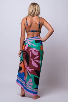 Unleash your inner beach goddess with our Ananya SARONG. Versatile and beachy, this sarong is perfect for all your summer adventures. Go from beach to bar in style with this must-have accessory. Fit Guide: One Size *available at our bandit location Summer Sarong For Beach Cover-up, Tropical Tie-side Sarong For Vacation, Tropical Vacation Sarong With Tie-side, Tropical Tie-side Sarong For Pool, Multicolor Beachy Dress For Poolside, Bohemian Tropical Print Sarong For Pool, Bohemian Sarong With Tropical Print For Pool, Multicolor Sarong For Pool And Vacation, Multicolor Sarong For Pool And Beach Season