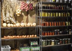 an assortment of spices and condiments on shelves