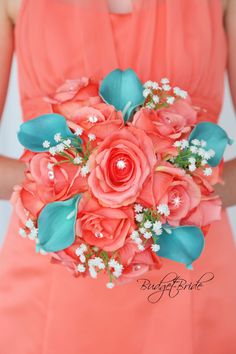 a bridesmaid holding a bouquet of coral colored flowers