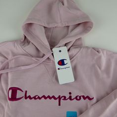 Champion Hoodie Champion Hoodie Soft Cotton / Poly / Elastane Blend Fleece Lined Attached Hood W Drawstrings Ribbed Cuffs & Hem Champion Embroidery Kangaroo Pocket Perfect For Workout Or Coffee Run! Approx Across Chest From Pit To Pit: Xxl: 26”. 3x: 27.5” Approx Length From Base Of Hood In Back: Xxl: 27”. 3x: 27”. Brand New W Tags Pricing Is Fair & Firm . Let Us Know If You Have Any Questions. Moma Champion Hoodie, Pink Long Sleeve Hoodie With Embroidered Logo, Pink Hooded Sweatshirt With Embroidered Logo, Casual Pink Hoodie With Embroidered Logo, Pink Champion Hoodie, Champion Cropped Hoodie, Crop Sweatshirt Hoodie, Champion Pullover, Coffee Run