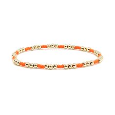 A Solid Statement Band: Flat woven; 1/2"w; 14K yellow/rose gold-filled or sterling silver clasp & 1" extender chain; glass seed beads. Strands: Stretch style; 14K yellow/rose gold-filled or sterling silver round 2mm, 3mm & 4mm beads; glass seed beads. Wrap: Stretch style that will wrap around the wrist 3 times (can also be worn as a necklace); glass seed beads. (When adding to cart, select your single bracelet size, and it will be multiplied in length by three when made). Shown in yellow gold; a Orange Beaded Bracelets For Everyday Wear, Gold Hand-strung Braided Bracelets, Gold Braided Bracelets With Tiny Beads, Yellow Gold Beaded Bracelet With Tiny Beads, Adjustable Yellow Gold Beaded Bracelet With Round Beads, Gold Beaded Braided Bracelet, Yellow Gold Beaded Bracelets With Colorful Beads, Orange Round Beads Jewelry For Everyday, Yellow Gold Beaded Bracelet With Colorful Round Beads