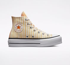 Brand new in original Converse box! SOLD OUT THROUGHOUT THE NATION!! Guaranteed Authentic Converse All Star Chuck Taylor Hi Tops CTAS Lift Hi Style Number: A03298C Super Rare Yellow and Orange Mixed Striped Print! Color: White/Cyber Mango/Light Curry Size: Please choose your U.S. WOMEN'S size from the dropdown menu toward the top of this listing Sturdy canvas textile upper featuring the limited edition striped print in pretty yellow/white/orange combo! Classic Chuck Taylor All-Star High Top Lace-Up Styling Comfortable cushioned interior footbed Textile lining Converse All Star license plate Iconic Chuck Taylor ankle patch Textured Converse signature rubber sole 1.5" platform 30 Day Returns Pet-Free and Smoke-Free Converse Mango Curry Yellow Orange Striped Chuck Taylor Hi Top Platform Sneak Boty Converse, Womens High Top Shoes, Chuck Taylor All Star Lift, Preppy Shoes, Shoe Inspo, Swag Shoes, Bright Colored, 90s Inspired, Platform Sneaker