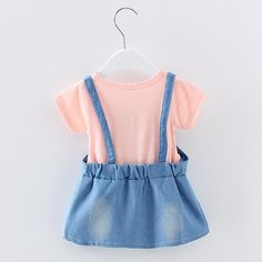 Cute Pink Suspender Dress For Spring, Cute Short Sleeve Denim Dress, Cute Cotton Suspender Dress For Summer, Cute Blue Denim Summer Dress, Casual Pink Pinafore Dress For Spring, Cute Cotton Pinafore Dress For Summer, Fitted Cotton Pinafore Dress For Summer, Summer Cotton Fitted Pinafore Dress, Spring Pink Denim Dress