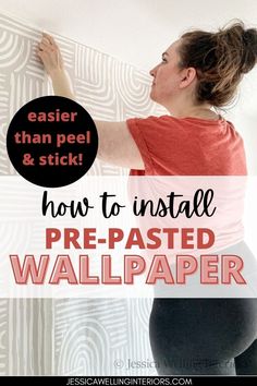 a woman painting the wall with text overlay that reads how to install pre - painted wallpaper