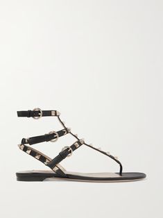 VALENTINO GARAVANI The Rockstud leather sandals | NET-A-PORTER Designer Evening Sandals With Spikes, Designer Calf Leather Sandals With Studded Outsoles, Designer Spiked Sandals For Summer, Luxury Spiked Sandals For Summer, Designer Ankle Strap Sandals With Spikes, Designer Spiked Ankle Strap Sandals, Valentino Flat Sandals, Valentino Garavani Logo Shoes, Valentino Rock Stud Bracelet