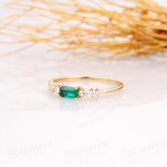 ※ Metal Type: 14k White/ Yellow/ Rose Gold ※ Center Stone: Lab Created Emerald (Green-5A/VVS) ※ Carat Weight: Baguette Cut 3x5mm - 0.13ct ※ Side Stones: Round Cut Moissanite - 0.17ctw (F/VVS1) ※ Band Width: 1.2mm ※ Band Thickness: 1.1mm ※ Height(From the stone to the finger): 3.1mm ※ SKU: ESR1593 ※ Accessories: *Shipped with beautiful ring box; *Directly price from Manufacturer, 1/3 the price from Jewelry Store; ※ Buy with Warranty: 1) 15 Days Money Back Guarantee; 2) Excellent Customer Service; 14k Gold Emerald Cut Emerald Ring For Wedding, Emerald Cut Wedding Ring In 14k Gold, Wedding Birthstone Ring With Baguette Cut In Prong Setting, 14k Gold Emerald Wedding Ring, Yellow Gold Diamond Emerald Ring For Wedding, Emerald Cut Diamond Ring In 14k Gold For Wedding, Yellow Gold Emerald Ring For Wedding, Fine Gold Emerald Wedding Ring, Emerald Birthstone Ring In Yellow Gold For Wedding