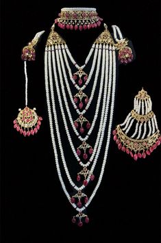 Made upon order bridal set fresh water pearls used Rubies used ( Chatham) Ruby beads in hanging 22ct gold plated includes - choker , earrings , jhoomar tika and satlada ships in 3-4 weeks from Levittown Pennsylvania Red Pearl Necklace For Wedding And Festivals, Bollywood Style Pearl Drop Jewelry For Reception, Ceremonial Kundan Jewelry With Pearl Drop, Red Pearl Chain Necklace For Wedding, White Stone Work Jewelry Sets For Ceremonial Occasions, White Ruby Necklaces For Wedding, White Jewelry Sets With Stone Work For Ceremonial Occasions, Ceremonial White Jewelry Sets With Stone Work, White Ruby Jewelry Sets For Wedding