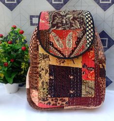 "( 1 ) Item - Kantha Work Backpacks Is Made Of High Quality Construction ( 2 ) Adjustable shoulder straps are well padded for ease of carrying. It has four external zip pockets for your quick access items. ( 3 ) Dimensions: 18\" inches x 13\" inches x 4\" inches (Height x Width x Depth). ( 4 ) If you are looking for a natural Kantha Work Laptop & Backpack, then for you A Must Buy Product which is uniquely designed in Indian Tradition Look ( 5 ) Wash Care, Hand Washable Bag" Patchwork Backpack For Daily Use, Everyday Use Standard Backpack With Patchwork, Standard Patchwork Backpack For Everyday Use, Everyday Patchwork Standard Backpack, Bohemian Beige Backpack, Bohemian Beige Rectangular Backpack, Bohemian Multicolor Backpack For Daily Use, Bohemian Brown Shoulder Backpack, Bohemian Brown Backpack