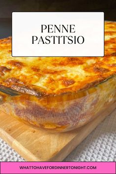 a casserole dish on a wooden cutting board with the words penne pasta written above it