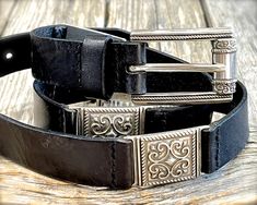 "*PLEASE NOTE measurements in inches. Compare belt size to one you currently own. DESCRIPTION: Vintage black leather belt with metal links LISTING QUANTITY: 1 Belt BRAND: Fossil YEAR: Not known ORIGIN: Not known MATERIAL: Leather, metal CONDITION: Good condition BELT SIZE: Medium LENGTH: 30\" to 34\" (measured from buckle to first and last hole) WIDTH: 1\" (measured at widest point) BUCKLE:" Vintage Black Belt With Antique Buckle, Vintage Black Belt Buckle With Antique Design, Vintage Black Belt With Removable Buckle, Black Belt Aesthetic, Belts Aesthetic, Belt Western, Western Buckles, Reclaimed Vintage, Metal Belt