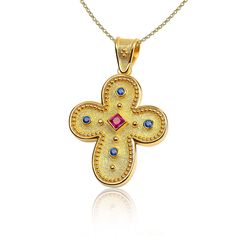 "The beauty of Byzantine style jewelry, completely handcrafted in Greece with the old-fashioned way, is omnipresent. An outstanding solid yellow gold cross with Byzantine design decorated with genuine gemstones, remains a classic and elegant choice for everyone. Bold and traditional, you will not take your eyes off. Neither will your friends! High Quality Handmade Greek jewelry! ✔ Dimensions: Inches: 1 X 0.65 inch ✔ Dimensions: Millimetres: 26 x 16.5 mm ✔ High quality product. ✔ In a gift box ✔ Byzantine Cross Jewelry For Ceremonial Occasions, Gold Byzantine Jewelry With Multi-stone, Gold Byzantine Multi-stone Jewelry, Byzantine Design, Byzantine Earrings, Byzantine Cross, Byzantine Gold, Cross Gold, Orthodox Cross