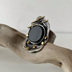 Round Black onyx ring sterling silver and 24 K gold plated, Black gemstone ring for women, textured band, an abstract ring made in Armenia All our jewelry is crafted with great attention to detail! We strive to provide you with the best quality, modern design, and perfect look!! All our jewelry is made of high-quality sterling silver and is stamped with a 925 stamp ◦* ◦* ◦* ◦* ◦* ◦* ◦* ◦* ◦* ◦* ◦* ◦* 【FULL DETAILS】 ► Gemstone: natural carborundum and pyrite ► RING Size: All sizes are available ( Modern Black Enamel Ring Jewelry, Modern Onyx Open Ring Jewelry, Modern Black Enamel Ring, Modern Sterling Silver Jewelry With Black Enamel, Modern Black Enamel Open Ring Jewelry, Modern Black Enamel Open Ring, Contemporary Rings With Unique Design For Gift, Modern Black Enamel Rings For Gifts, Unique Onyx Gemstone Rings