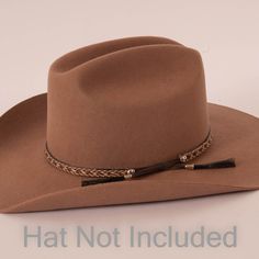 Description - One Size Fits All - Lenght 11 3/4" Introducing Bodie, the hat band that will add a touch of class and elegance to any outfit. Bodie is made of high quality materials, and features intricate braiding on the band. It's the perfect accessory for any formal or dressy occasion. Bodie is available in two classic colors, black and brown.So don't wait any longer, add Bodie to your wardrobe today! **Please note this is the hatband only** Shipping and Returns Orders generally arrive within 3 Cowboy Hat Band, Class And Elegance, Cowboy Hat Bands, American Hat Makers, Brown Hats, Touch Of Class, Hat Band, The Band, Cowboy Hat