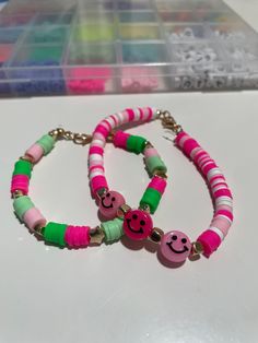 Watermelon themed beaded bracelets. Handmade bracelets with elastic bands. Playful Adjustable Friendship Bracelets With Round Beads, Adjustable Playful Friendship Bracelets With Round Beads, Fun Green Stretch Bracelet For Friendship, Fun Adjustable Beads For Gifts, Handmade Green Novelty Beaded Bracelets, Playful Adjustable Bracelets With Heart Beads, Handmade Green Novelty Beaded Bracelet, Playful Adjustable Bracelet With Heart Beads, Handmade Green Beaded Novelty Bracelet