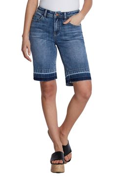 Partially made with sustainably sourced fibers, these stretchy Bermuda shorts feature a relaxed fit and released hems that create a modern silhouette. 11" inseam; 19" leg opening; 10 1/2" front rise Zip fly with button closure Five-pocket style 69% cotton, 27% REPREVE® recycled polyester, 3% rayon, 1% spandex REPREVE recycled polyester is made from 100% post-consumer recycled plastic bottles Machine wash, tumble dry Imported Mid-rise Bermuda Shorts With Frayed Hem In Medium Wash, Mid-rise Medium Wash Bermuda Shorts With Frayed Hem, Medium Wash Cotton Bermuda Shorts With Frayed Hem, Spring Mid-rise Dark Wash Bermuda Shorts, Denim Bermuda Shorts With Frayed Hem, Mid-rise Bermuda Shorts With Frayed Hem And Relaxed Fit, Relaxed Fit Bermuda Shorts With Frayed Hem, Dark Wash Bottoms With Built-in Shorts Relaxed Fit, Casual Mid-rise Bermuda Shorts With Frayed Hem