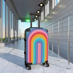 Make a statement while traveling with a custom designed carry-on roller suitcase - durable and fashionable. Perfect gift for avid traveler or a weekender bag. Three convenient sizes for a stylish jetsetter!  Retro Rainbow Luggage, Colorful Pride LGBTQ Custom Suitcase, Weekender Bag, 70s Carry-On, Roller Bag, Personalized luggage for your favorite traveler.  Traveling is best done in style, and suitcases help anyone do exactly that. Available in multiple sizes to accommodate your needs, they come with an adjustable handle, 360 degree swivel wheels, a safety lock, and an adjustable handle for carefree movement through airports and cities. To achieve high-resolution designs, prints go on a canvas surface that is encapsulated in the PC shell. .: Three sizes:  .: Small:  23 x 13.5 x 9 in.   7.5 Rectangular Portable Luggage For Travel, Trendy Luggage With Sleeve For Weekend Trips, Multicolor Rectangular Travel Bag For Trip, Rectangular Luggage With Luggage Sleeve For Overnight Trips, Trendy Luggage With Luggage Sleeve For Trips, Portable Rectangular Luggage For Trip, Multicolor Travel Bag With Luggage Sleeve For Trip, Retro Rectangular Travel Bag For Trips, Trendy Rectangular Luggage For Trips