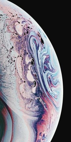 the back side of an iphone xr with colorful swirls and bubbles on it