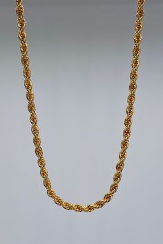 An intricate industrial styled rope chain is elegantly cast in 18 karat gold fill. Dressed up or down, the chain texture and detail is just beautiful, and it will easily become your go-to favorite. 18k Gold Fill Chain Length is 18" Chain Links are 2mm Handcrafted in the USA Ships from the USA Why we love this product? Simply stunning, the rich gold color sparkles, and the necklace when held is lightweight and balanced. The craftsmanship is stunning and the intricate design can be worn with anyth Gold Rope Chain Necklace As A Gift, Gold Rope Chain Link Necklace, Gold Link Rope Chain Necklace, Gold Plated Rope Chain Necklace As Gift, Gold Necklaces With Rope Chain And Link Shape, Gold Figaro Rope Chain Necklace, Classic Gold Rope Chain Necklace With Adjustable Chain, Classic Gold Rope Chain Necklace With Figaro Detail, Gold Classic Figaro Rope Chain Necklace