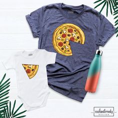 Pizza and Pizza Slice T-shirts, Pizza Matching Family Shirt, Parent Child Pizza Shirt, Pizza and Pizza Slice, Pizza Shirts Set, Pizza Shirts. Hi! Welcome to our store. It's good to see you here. Our aim is to offer you first-class clothing in your most beautiful moments with our graphic t-shirts that we designed or designed with your ideas. I am sure you will like our designs for your family, friends and you. IMPORTANT MATTERS FOR ORDERING: 1-) Please check and review all photos. 2-) Our sizes a Funny Crew Neck Shirt With Sublimation Print, Fun Crew Neck Shirt With Sublimation Print, Pre-shrunk Crew Neck Shirt For Family Matching, Family Matching Short Sleeve Shirt With Funny Print, Family Matching Funny Print Short Sleeve Tops, Family Matching Tops With Funny Print Short Sleeve, Baby Birthday Shirts, Slice Pizza, Matching Family Shirt