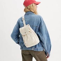 Sling Bag - White | Levi's® US White Levis, Rucksack Bag, White Bag, Sling Bag, Hands Free, The Block, Snap Closure, Cotton Canvas, Levi's