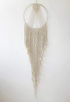 a macrame hanging on the wall in a room