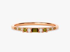 Find serendipity in the Baguette Peridot Ring. The whimsical peridots, encircled by dainty round sidestones, embody positivity and renewal. This ring serves as an ideal talisman for those born in the vibrant month of August. Month Of August, Peridot Ring, Gold Yellow, Solid Gold, 18k Gold, Rose Gold, Ring, Yellow, Gold