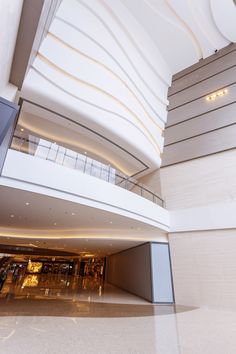 the inside of a large building with stairs