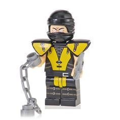 a lego figure wearing a helmet and holding a chain