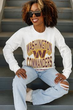 Bring the energy of the game to your wardrobe with our Washington Commanders oversized long sleeve tee with ribbed neckline and cuffs. Showing off your Washington Commanders spirit will be a breeze. White T-shirt With Ribbed Cuffs For College, White School Spirit Sweatshirt For Streetwear, White School Spirit Sweatshirt With Ribbed Cuffs, White Oversized Sweatshirt With School Spirit, White Sweatshirt With Ribbed Cuffs For School Spirit, White Long Sleeve College Style T-shirt, Oversized White Sweatshirt For Campus, Varsity Long Sleeve T-shirt For Campus, White Varsity T-shirt For Fall