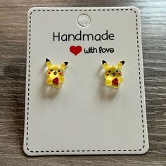 This Listing Is For A Pair Of Handmade Pikachu Earring Studs. Earring Stud Is 5mm And Made Out Of Stainless Steel. Hypoallergenic Earring Post And Earring Back. Pikachu Is Made Out Of Acrylic. Super Cute For Kids Or Adults! :) **Comes From A Smoke Free Home** Fun Yellow Jewelry For Birthday, Playful Adjustable Yellow Earrings, Cute Handmade Yellow Jewelry, Playful Hypoallergenic Yellow Earrings, Playful Yellow Hypoallergenic Earrings, Handmade Yellow Novelty Jewelry, Yellow Handmade Novelty Jewelry, Cute Yellow Hypoallergenic Jewelry, Fun Yellow Round Jewelry