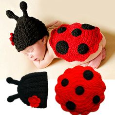 a baby sleeping next to two crocheted ladybug hats