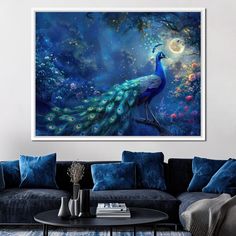 a peacock sitting on top of a blue couch next to a table in a living room