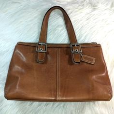 Up for sale is a pre-loved vintage leather Coach bag. Please see pics as the bag is in pre-loved condition. Has been cleaned/conditioned. Minor markings to leather exterior. Minor water/oil mark to exterior. Please look at pics very carefully! Zoom in, if possible. Guaranteed 100% Authentic. COA also available for additional $30. Please ask any additional questions!  Thanks for looking! Questions? Leave a comment below! Vintage Satchel Bags With Silver-tone Hardware, Vintage Travel Shoulder Bag With Silver-tone Hardware, Vintage Shoulder Bag With Silver-tone Hardware For Travel, Vintage Shoulder Bag For Travel With Silver-tone Hardware, Vintage Satchel With Silver-tone Hardware For Everyday Use, Vintage Shoulder Bag With Silver-tone Hardware And Double Handle, Vintage Soft Leather Satchel With Double Handle, Vintage Double Handle Shoulder Bag With Silver-tone Hardware, Vintage Brown Bags With Silver-tone Hardware