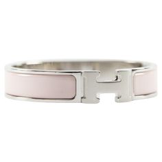 Hermès Clic H GM Bracelet in Rose Candeur & Palladium Wrist size: 16.8 cm Width: 8 mm Made in France Pink Hermes Bracelet, Hermes Bracelet Silver, Hermes Jewellery, Pink Hermes, H Bracelet, Hermes Bracelet, Hermes Jewelry, Modern Bracelets, Pink Bracelet