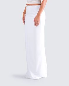 A white maxi skirt is a staple that everyone needs 🙌 With a simple and sleek design, this look is perfect for dressing up or down for any occasion. Made from a slinky jersey fabric, and complete with a mid-rise fit and ruching details 🤍 Spring Elastane Maxi Skirt, White Fitted Elastane Maxi Dress, Evening Maxi Skirt With Stretch, Chic Stretch Maxi Skirt, Stretch Maxi Skirt For Evening, Evening Stretch Maxi Skirt, Full Length Stretch Elastane Skirt, Flowy Elastane Maxi Skirt, Fitted Maxi Length Skirt